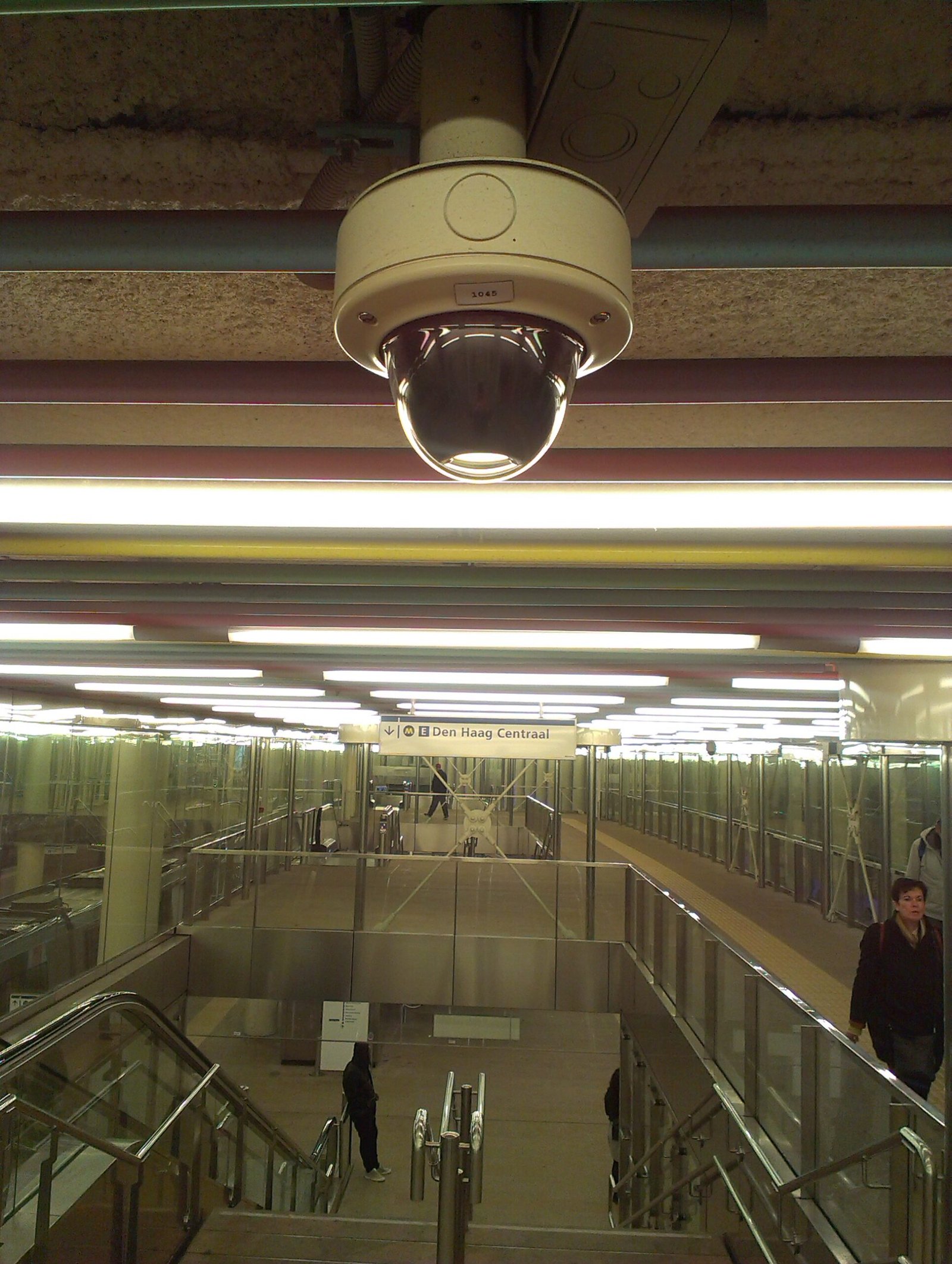 Dome security camera in a public indoor space