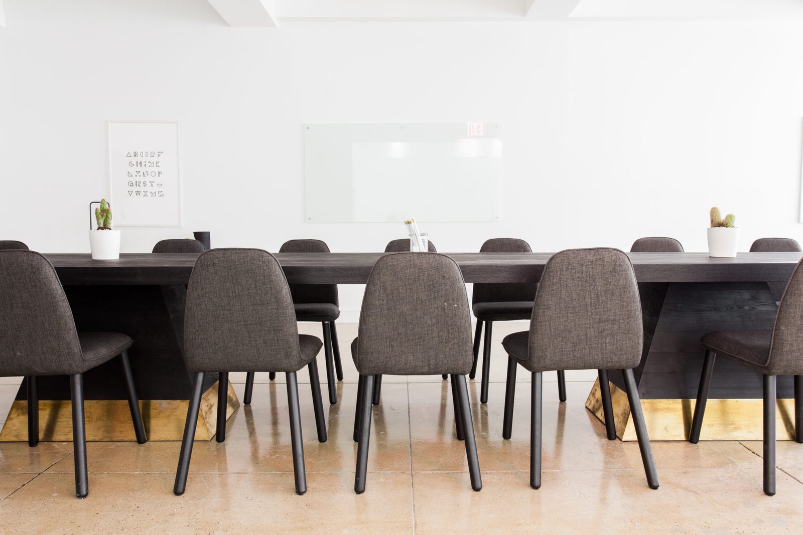 A boardroom meeting table with chairs