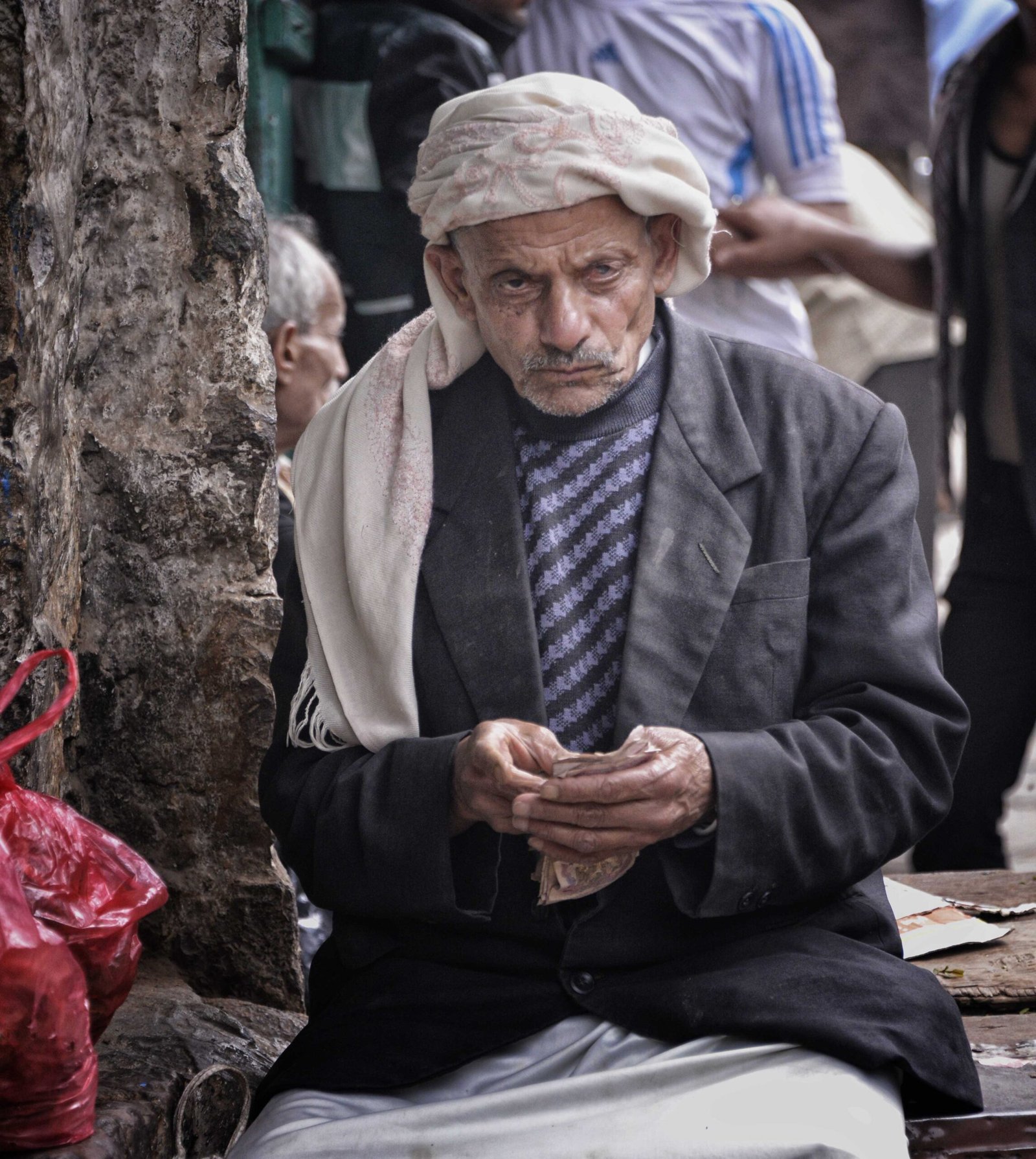 A person counting banknotes