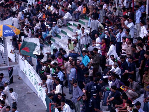 A cricket stadium crowd during a match