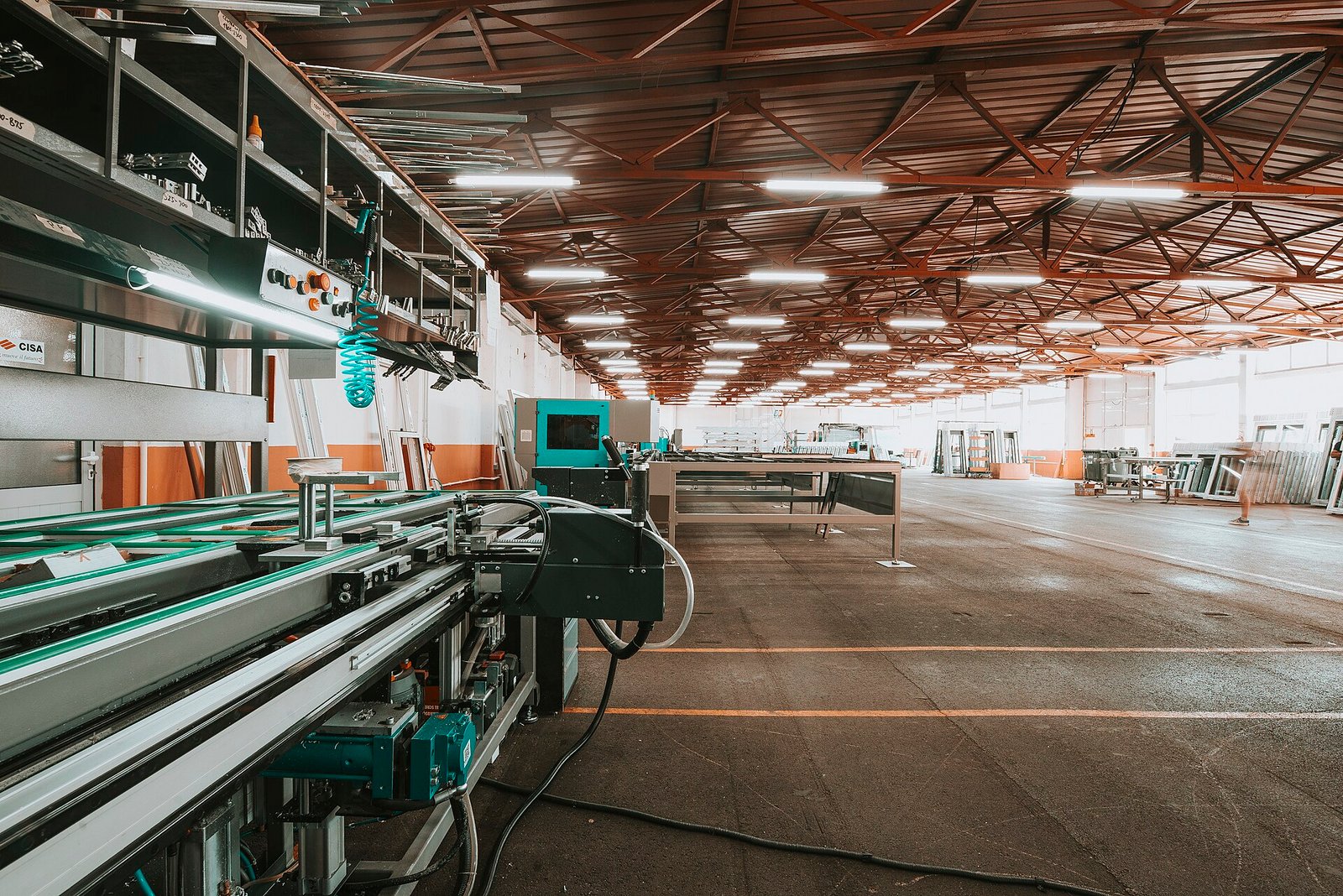 Industrial production line operating in a large modern factory