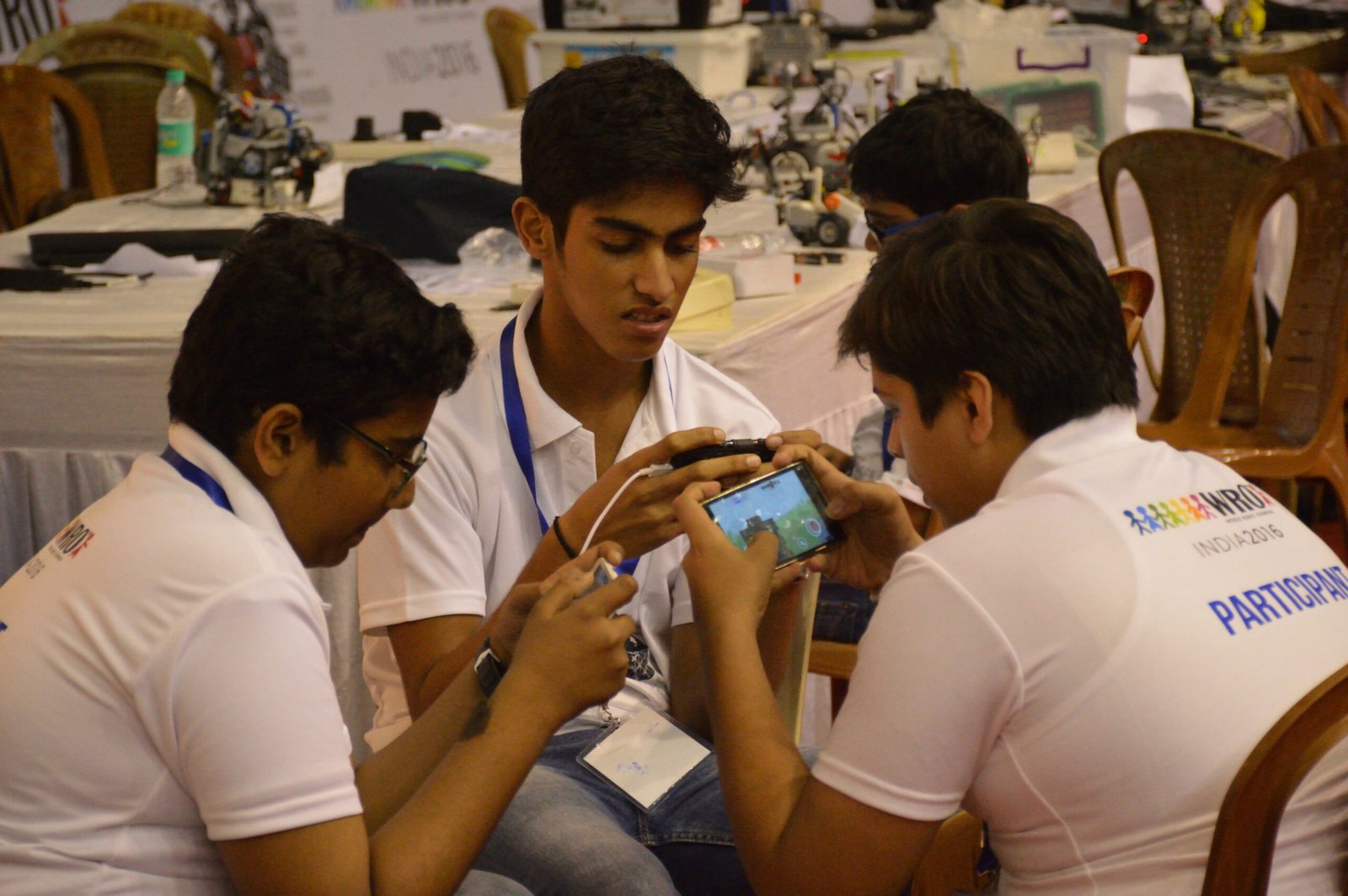 Students playing a mobile game on a smartphone (file photo)