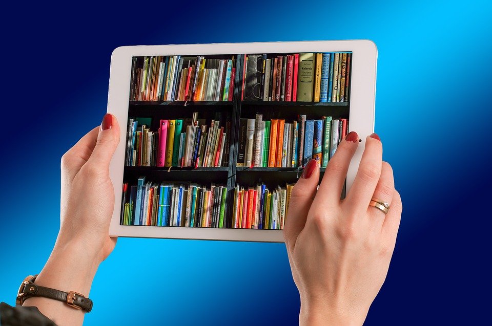 A tablet displaying a bright, colourful screen