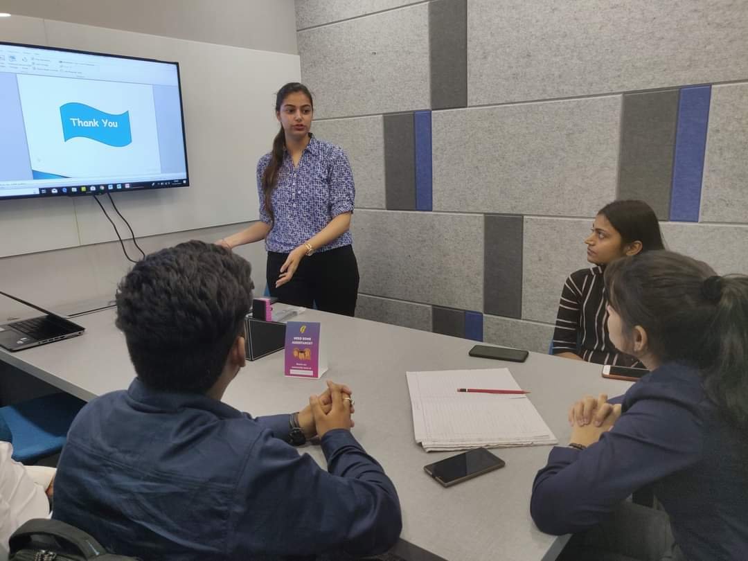 A startup team discussing a product prototype