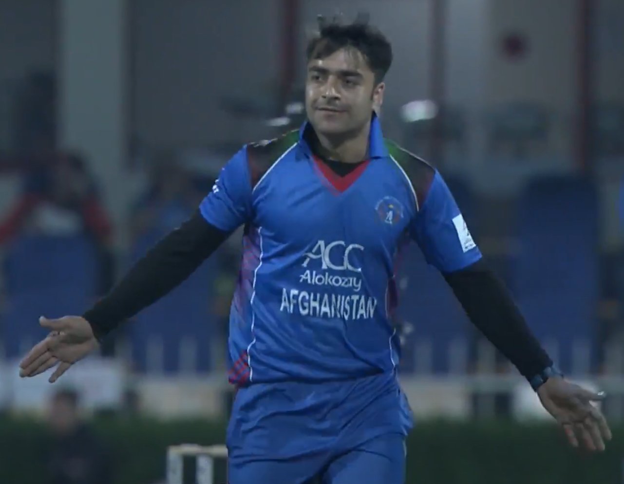 Afghanistan cricket team players in action against Zimbabwe