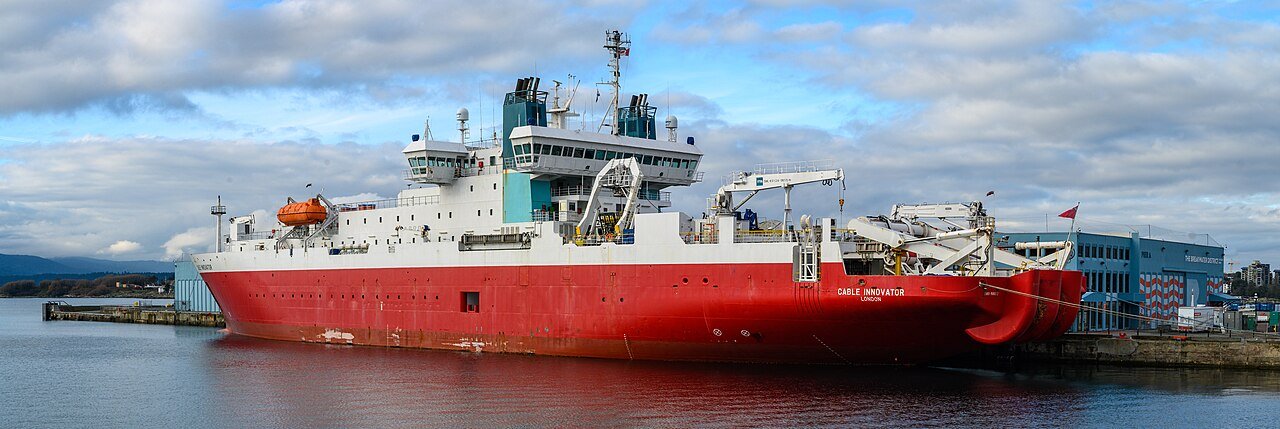 A submarine cable-laying vessel at sea — illustrative of the undersea cable systems linking Pakistan to the world