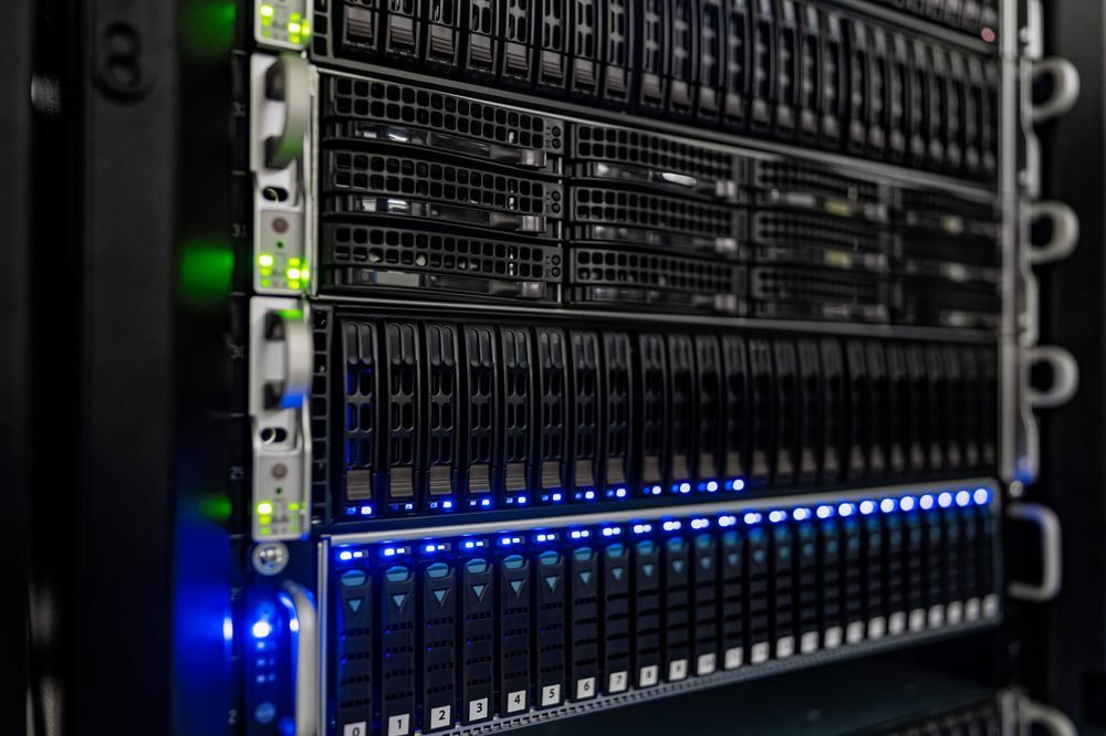 Rows of server racks in a data centre corridor