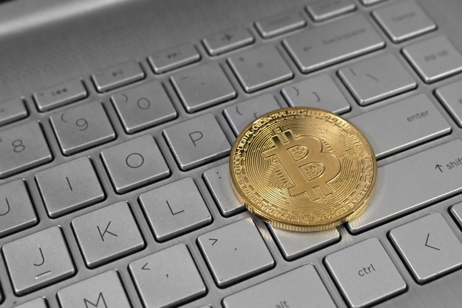 Cryptocurrency trading on a laptop — licensed Pakistani exchanges must now build full AML compliance programmes