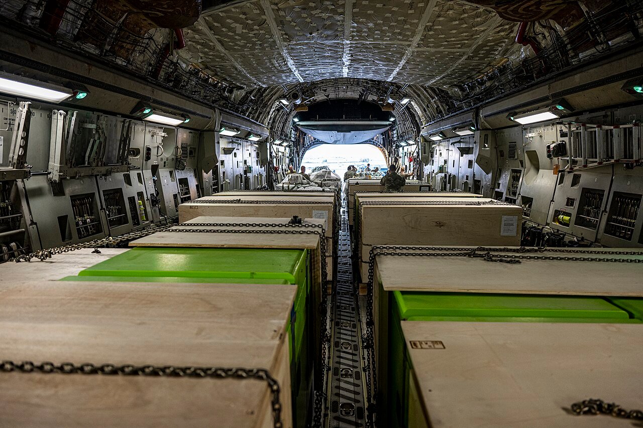 humanitarian aid being loaded for flood disaster relief