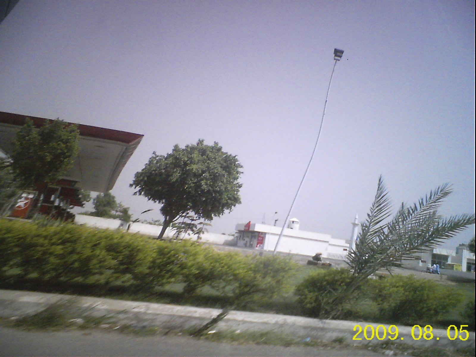 Petrol pump on G.T. Road, Pakistan — global oil prices five-month high