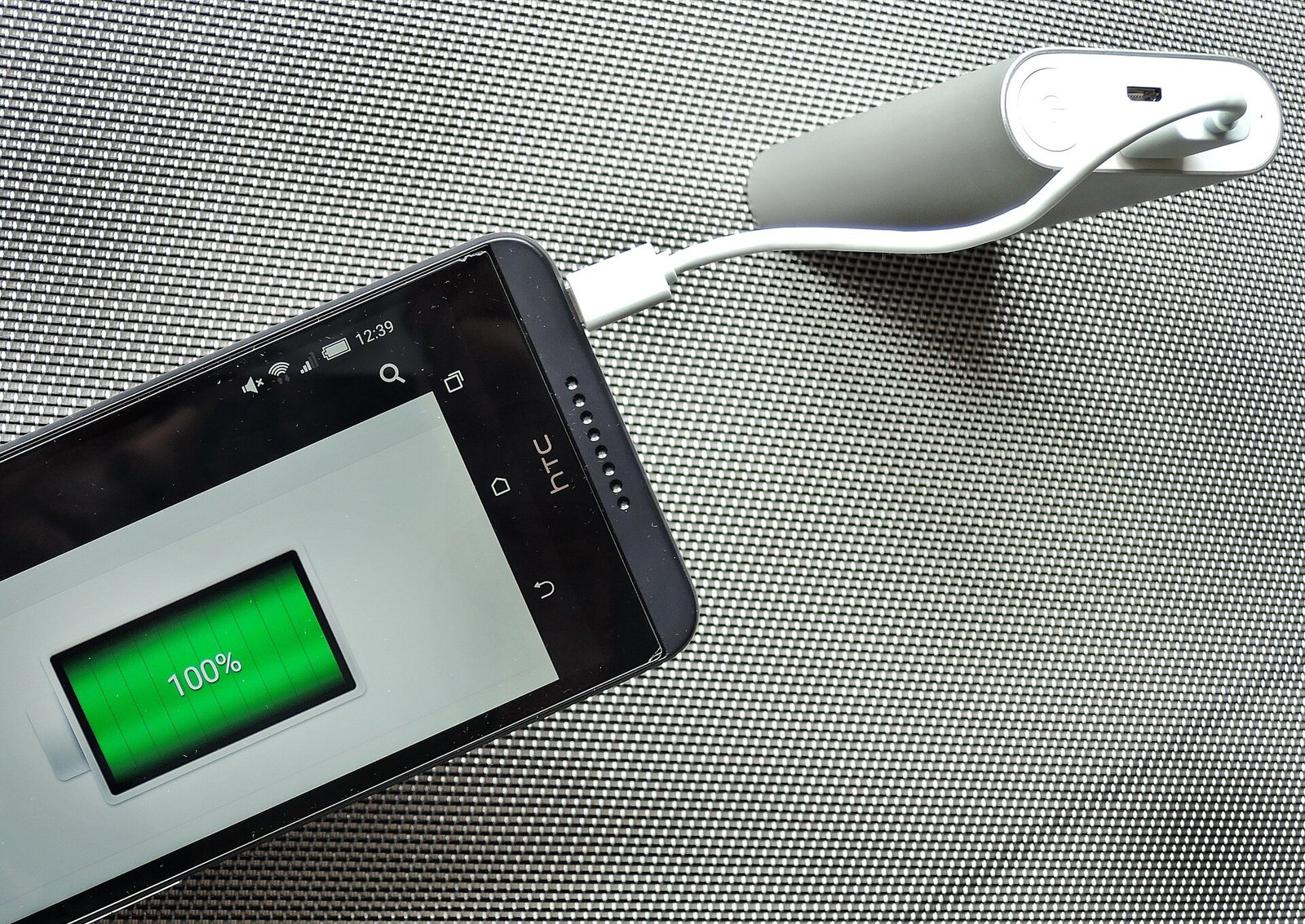 A smartphone charging with a USB power bank; the Poco X8S supports 100W wired charging (File photo)