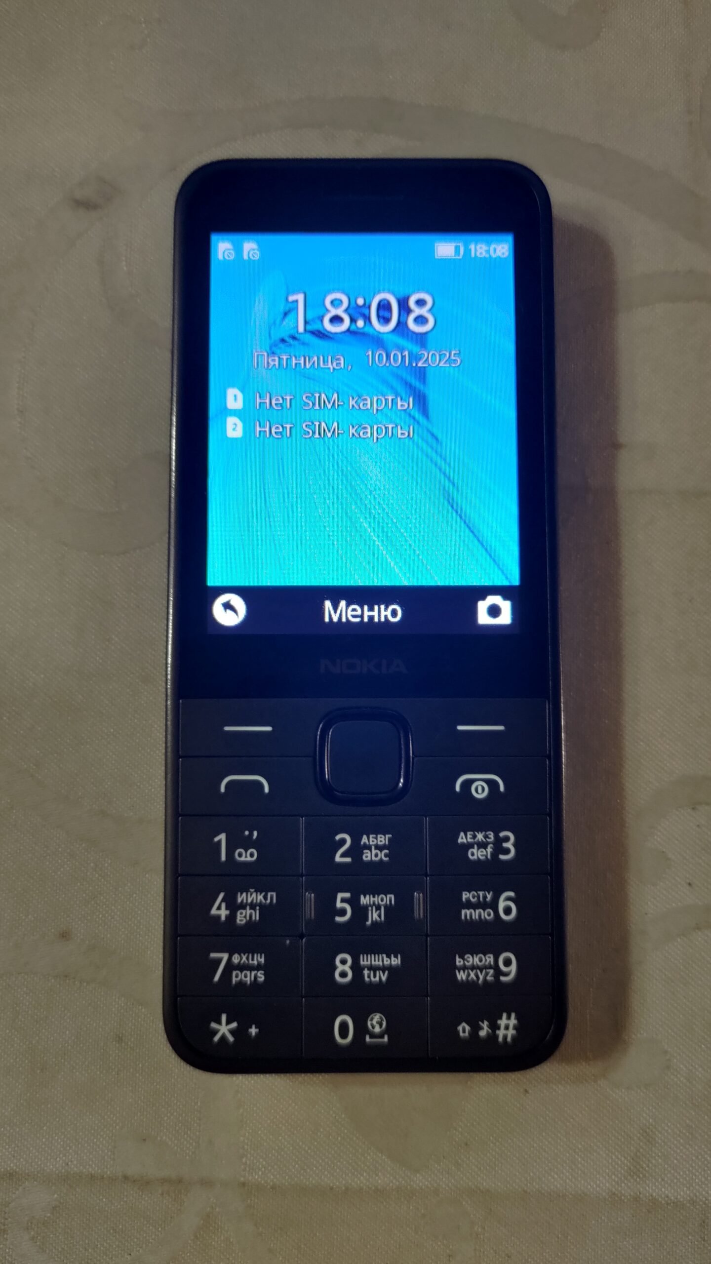 Close-up of a Nokia feature phone keypad
