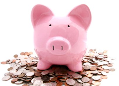 Piggy bank with coins, National Savings profit rates savings Pakistan