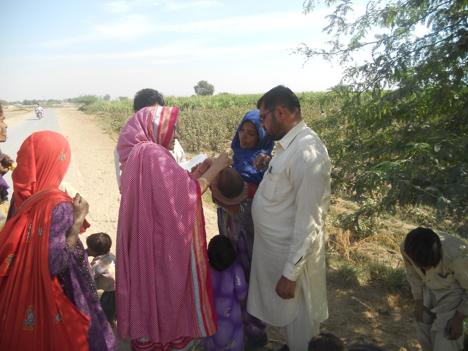 Karachi polio case: a health worker vaccinates children against polio in Pakistan during a vaccination drive (file photo)