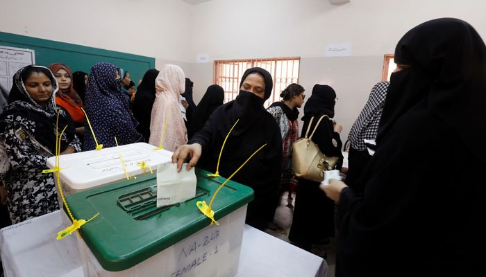 Women casting votes at a polling station in Pakistan — ECP AI election rules for election campaigns